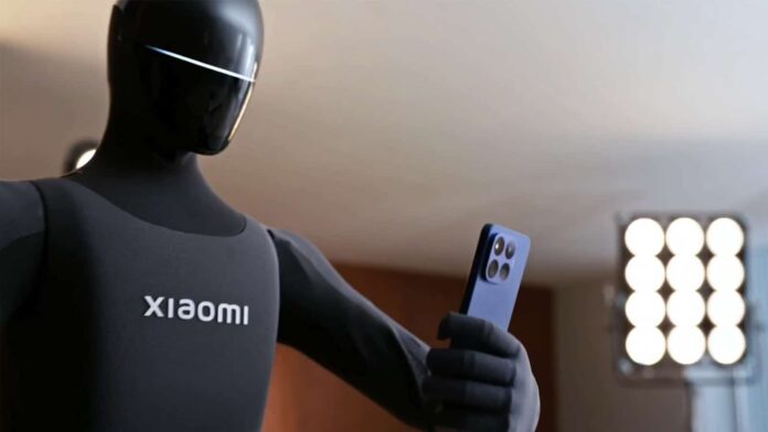 Xiaomi ρομπότ κινητό στη σκηνή κρατάει το Xiaomi 17T Pro και τραβάει φωτογραφία